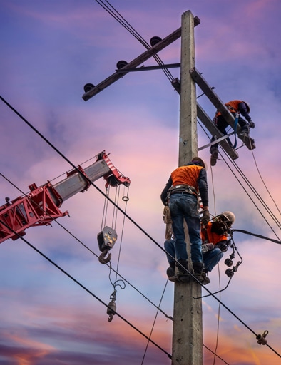 Electrician lineman with cranes and hoists repairman worker at c